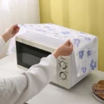 Waterproof microwave oven dust cover with side storage pockets