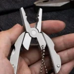 Compact Multi-Tool Pliers Knife Keychain with screwdriver and travel kit for outdoor use