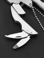Compact Multi-Tool Pliers Knife Keychain with screwdriver and travel kit for outdoor use