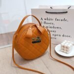 Trendy round crossbody bag for women with quilted design and long strap – available in 7 colors