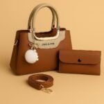Jing & Pin 2pcs synthetic leather handbag set with pompom keychain