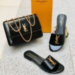 A set of YSL Saint Laurent-inspired flat slippers and a small crossbody bag with a half-chain shoulder strap, shown in one of the three available colors.
