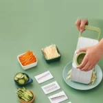 Multi-functional stainless steel grater and vegetable cutter, showing the various grating and slicing surfaces of the durable kitchen food preparation tool.
