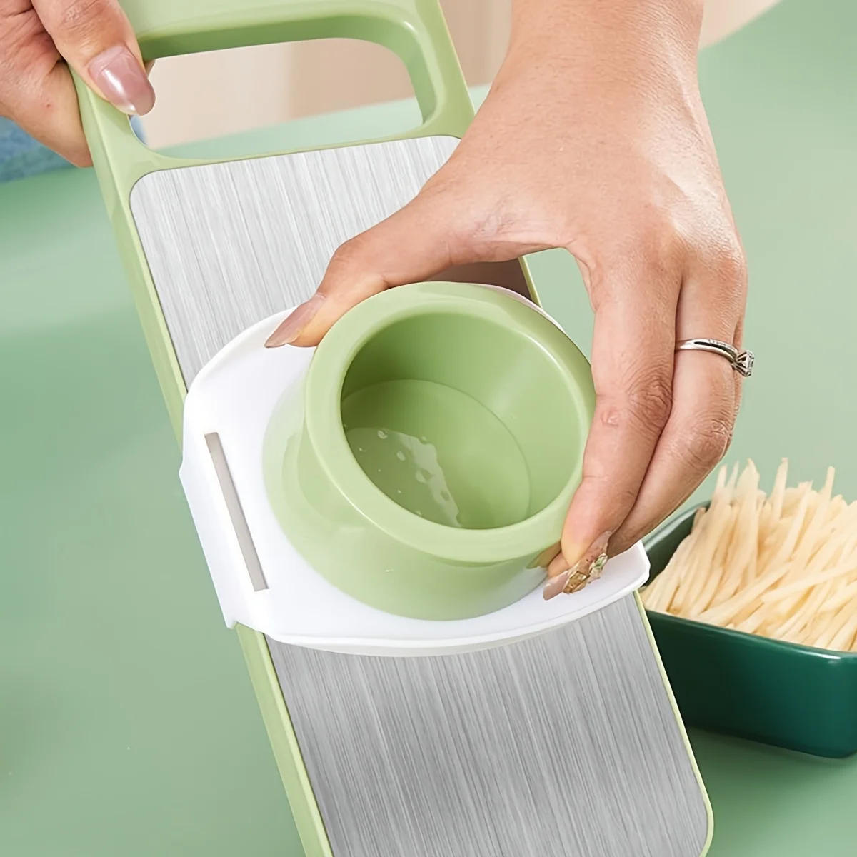 Stainless-Steel-Vegetable-Grater-Cutter-Multi-functional-Shredder.jpg Multi-functional stainless steel grater and vegetable cutter, showing the various grating and slicing surfaces of the durable kitchen food preparation tool.