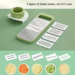 Multi-functional stainless steel grater and vegetable cutter, showing the various grating and slicing surfaces of the durable kitchen food preparation tool.