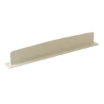 Flexible silicone sink baffle plate/splash guard in a kitchen sink, shown attached to the edge to prevent water and oil from spraying onto the counter.