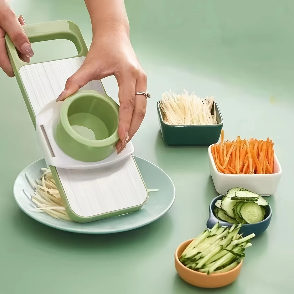 Stainless-Steel-Vegetable-Grater-Cutter-Multi-functional-Shredder.jpg Multi-functional stainless steel grater and vegetable cutter, showing the various grating and slicing surfaces of the durable kitchen food preparation tool.