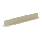 Flexible silicone sink baffle plate/splash guard in a kitchen sink, shown attached to the edge to prevent water and oil from spraying onto the counter.