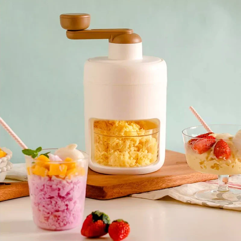 Manual hand-crank ice crusher machine with a visible collection mold/cup, showing its commercial-grade housing and mechanism for making crushed or shaved ice.