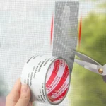 Roll of waterproof, self-adhesive screen repair tape showing the mesh texture, used to patch a hole in a window or door anti-insect mosquito screen.
