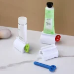 Rolling Tube Toothpaste Squeezer – Rotating Dispenser Stand