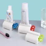 Rolling Tube Toothpaste Squeezer – Rotating Dispenser Stand