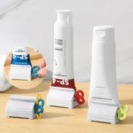 Rolling Tube Toothpaste Squeezer – Rotating Dispenser Stand