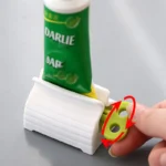 Rolling Tube Toothpaste Squeezer – Rotating Dispenser Stand