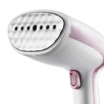 Hanging ironing machine with continuous steam jet electric iron