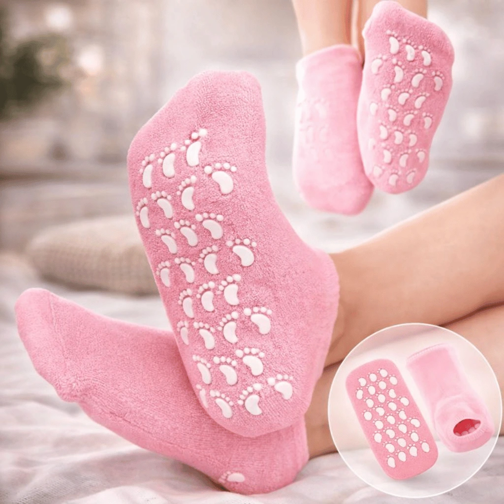 Pink moisturizing spa gel socks with non-slip grips for foot care